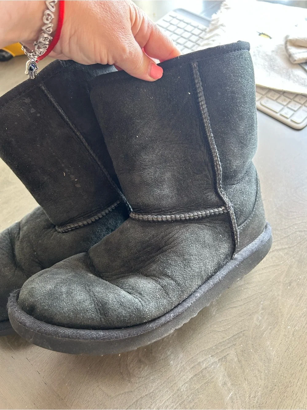Well loved UGG Black Suede Shearling Boots